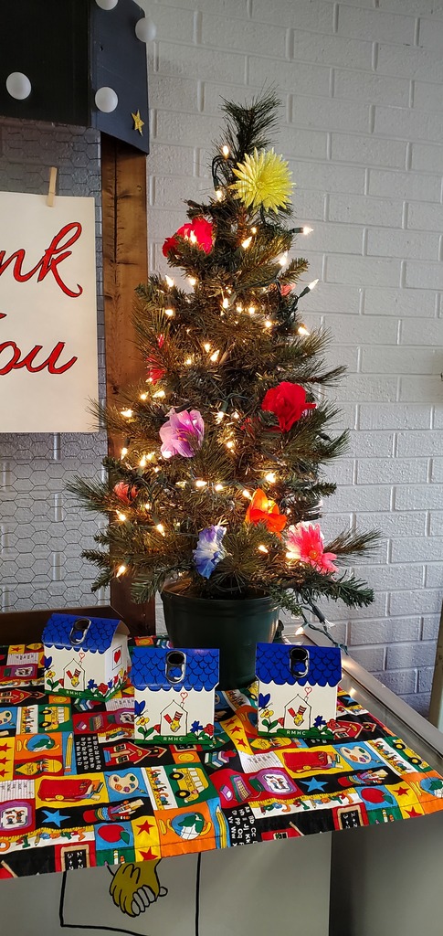 tree with donation boxes