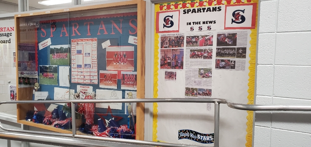bulletin board, news articles, team pictures 